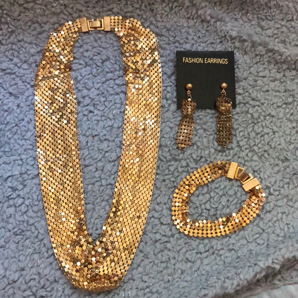 Matching necklace, bracelet, and earring set